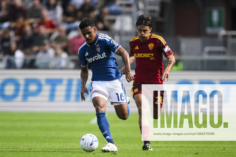 Como 1907 v AS Roma - Serie A Kaiki Bruno of Como 1907 competes for the ball with Paulo Dybala of AS Roma during the Serie A football match between Como 1907 and AS Roma. Como Italy