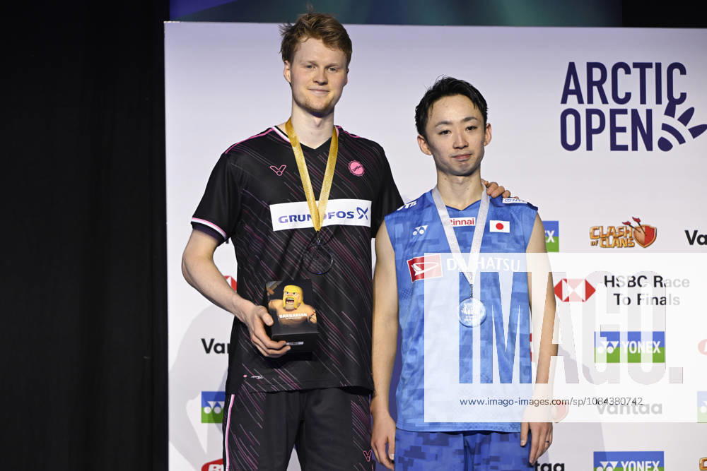 Gold medalist Anders Antonsen of Denmark (L) and silvers medalist Yushi Tanaka of Japan pose after the men s singles match in the finals at the badminton Clash of Clans Arctic Open 2026 tournament in Vantaa, Finland, on October 11, 2026. - ANTTI AIMO-KOIVISTO Vantaa Finland WFLzGXdsYKs