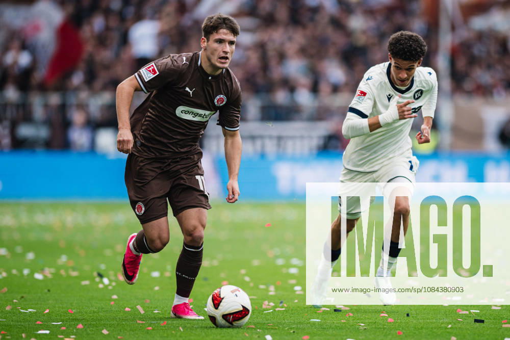 2. Bundesliga: FC St. Pauli vs. Karlsruher SC, 11.10.2026 Arkadiusz Pyrka (FC St. Pauli, 11) gegen Louey Ben Farhat (Karlsruher SC, 19)); Fußball, 2. Bundesliga, 7. Spieltag: FC St. Pauli vs. Karlsruher SC am 11.10.2026 im Millerntor-Stadion, Hamburg DFL REGULATIONS PROHIBIT ANY USE OF PHOTOGRAPHS AS IMAGE SEQUENCES AND OR QUASI-VIDEO.