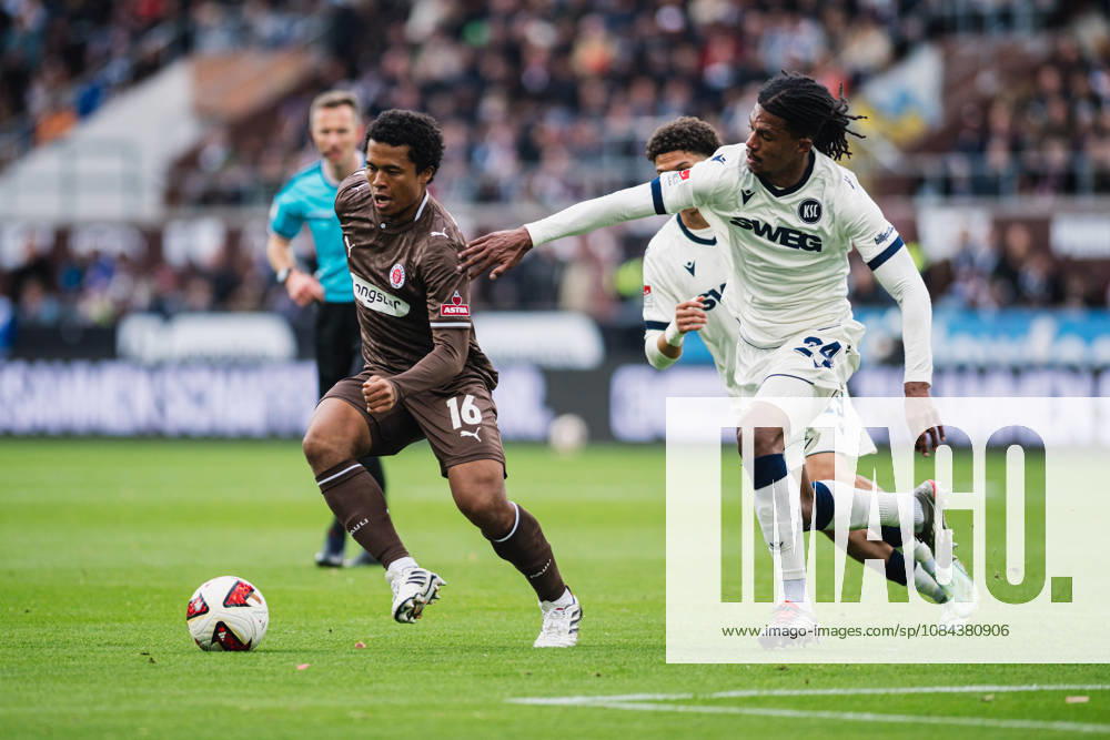 2. Bundesliga: FC St. Pauli vs. Karlsruher SC, 11.10.2026 Joel Fujita (FC St. Pauli, 16) gegen Sandro TrÃ moulet (Karlsruher SC, 24); Fußball, 2. Bundesliga, 7. Spieltag: FC St. Pauli vs. Karlsruher SC am 11.10.2026 im Millerntor-Stadion, Hamburg DFL REGULATIONS PROHIBIT ANY USE OF PHOTOGRAPHS AS IMAGE SEQUENCES AND OR QUASI-VIDEO.