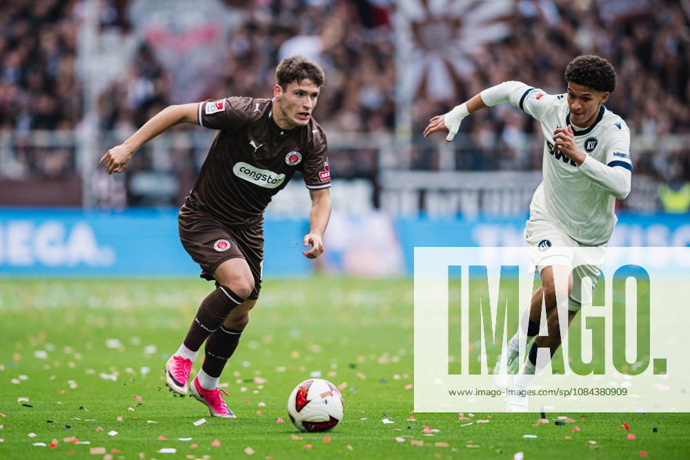 2. Bundesliga: FC St. Pauli vs. Karlsruher SC, 11.10.2026 Arkadiusz Pyrka (FC St. Pauli, 11) gegen Louey Ben Farhat (Karlsruher SC, 19)); Fußball, 2. Bundesliga, 7. Spieltag: FC St. Pauli vs. Karlsruher SC am 11.10.2026 im Millerntor-Stadion, Hamburg DFL REGULATIONS PROHIBIT ANY USE OF PHOTOGRAPHS AS IMAGE SEQUENCES AND OR QUASI-VIDEO.