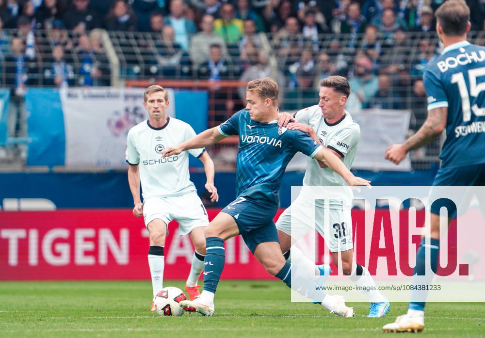 Deutschland: Fussball 2.Bundesliga 2026 2027, 7. Spieltag - VfL Bochum vs Arminia Bielefeld - Vonovia Ruhrstadion (Bochum): im Zweikampf Christian Rasmussen (VfL Bochum, 7) Marius Wörl Marius Woerl (Arminia Bielefeld, 38)