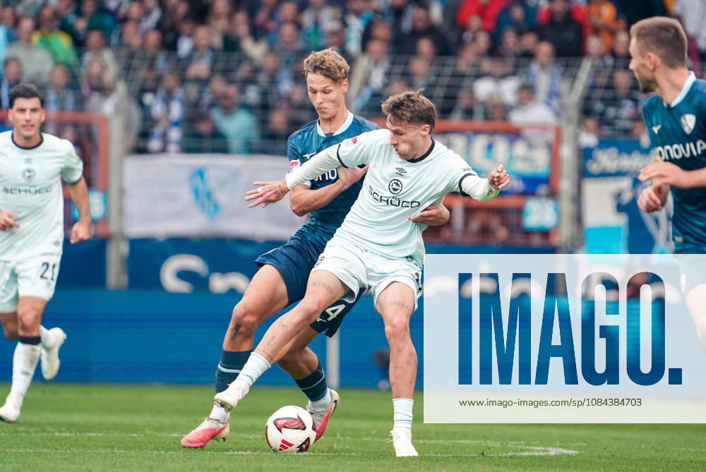 Deutschland: Fussball 2.Bundesliga 2026 2027, 7. Spieltag - VfL Bochum vs Arminia Bielefeld - Vonovia Ruhrstadion (Bochum): im Zweikampf Joel Grodowski (Arminia Bielefeld, 11) Tom Meyer (VfL Bochum, 34)