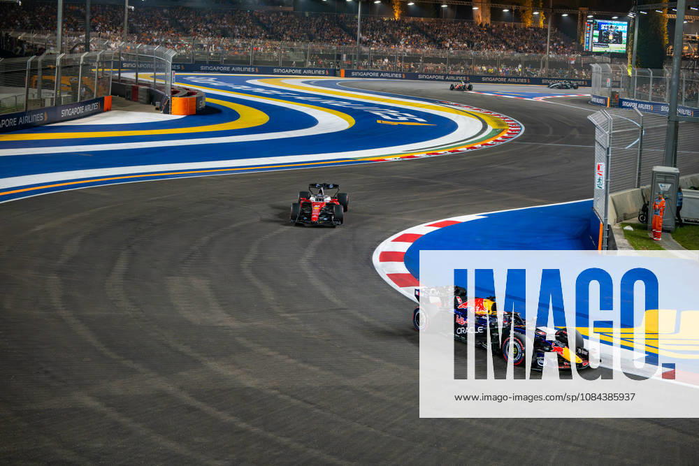 11th October 2026; Marina Bay, Singapore; Formula 1, Singapore Grand Prix, Race Day; Lap 12 and Max Verstappen of Red Bull Racing holds off Charles Leclerc of Ferrari DavidxAsh