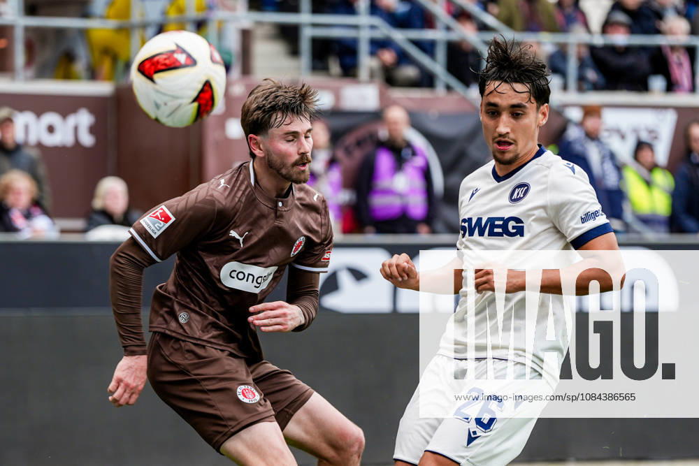 Deutschland: Fußball 2. Bundesliga 2026 27, 7. Spieltag FC St. Pauli vs Karlsruher SC Millerntor-Stadion (Hamburg St. Pauli): Connor Metcalfe (FC St. Pauli, 24), Danyal Zor (Karlsruher SC, 26)