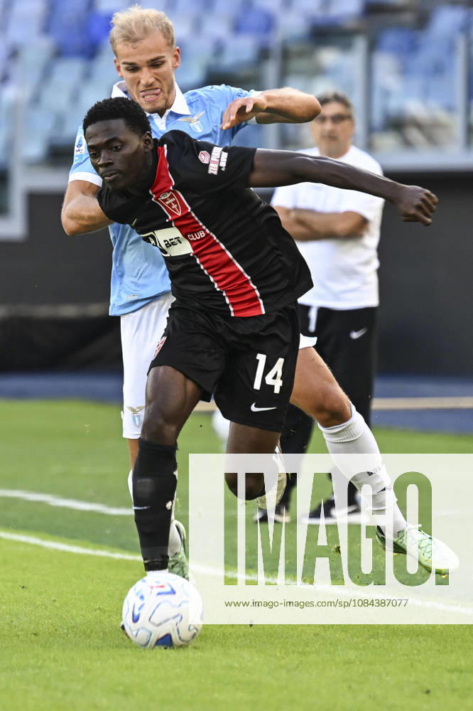 Monzas Ebenezer Akinsanmiro (R) in action against Lazios Oliver Provstgaard (L) during the Serie A soccer match between SS Lazio and AC Monza at the Olimpico stadium in Rome, Italy, 11 October 2026. ANSA RICCARDO ANTIMIANI. Serie A: Lazio Vs Monza - ZUMAa110 20261011_zaf_a110_016