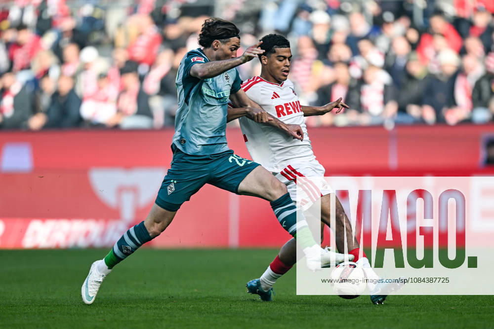 V. li. im Zweikampf Joe Scally (Moenchengladbach 29) Jahmai Simpson-Pusey (Koeln 22) 11.10.2026 ¢ Fussball ¢ 1. FC Koeln vs Borussia Moenchengladbach, RheinEnergieStadion, Koeln, DFB DFL REGULATIONS PROHIBIT ANY USE OF PHOTOGRAPHS AS IMAGE SEQUENCES AND OR QUASI-VIDEO NRW Germany