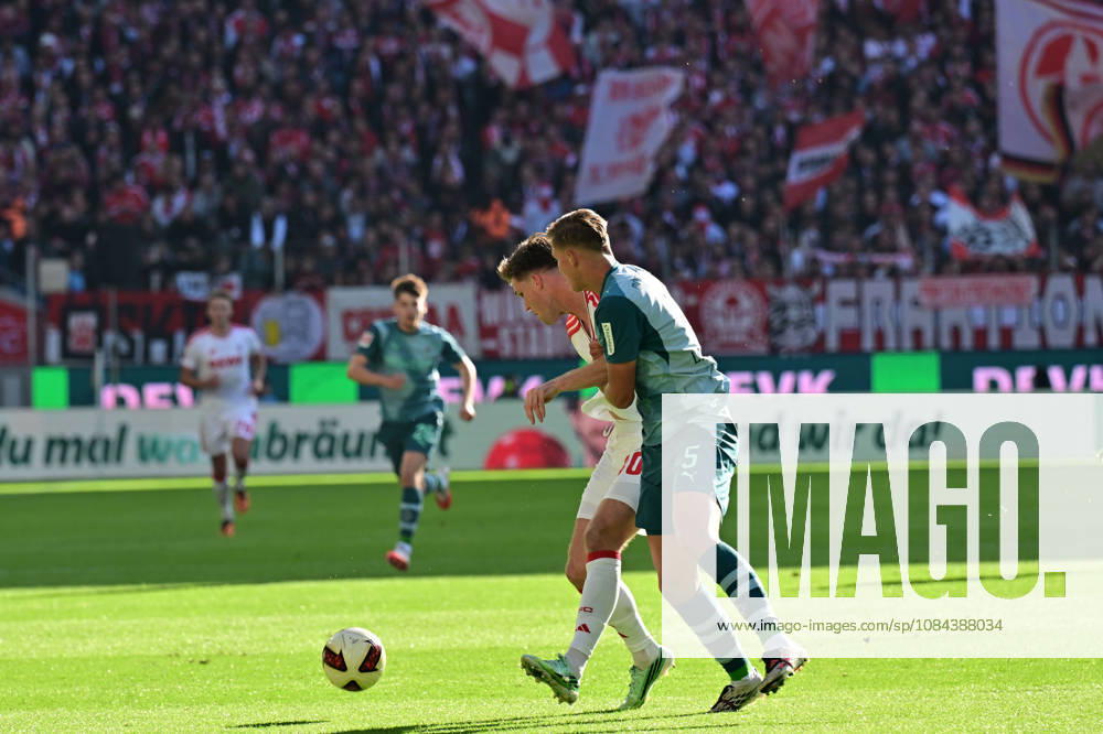 Koeln; Fussball, Herren, Saison 2026 2027, 1. FC Koeln vs. Borussia Moenchengladbach Zweikampf zwischen Marias Buelter (Koeln), Jan Leszczynski (Gladbach) DFL regulations prohibit any use of photographs as image sequences and or quasi-video. Rhein-Energie-Stadion Nordrhein-Westfalen Deutschland