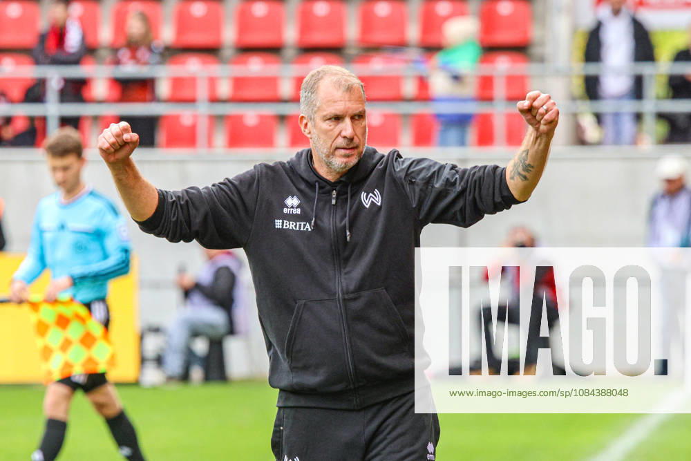 Trainer Jochen Seitz (Cheftrainer SV Wehen Wiesbaden) wirkt sehr entspannt nach seinem ersten Spiel fuer Wiesbaden beim Spiel FC Ingolstadt 04 gegen SV Wehen Wiesbaden am 11.10.2026, DFB regulations prohibit any use of photographs as image sequences and or quasi-video. GER, Fussball, 3. Liga, Spieltag 8, FC Ingolstadt 04 gegen SV Wehen Wiesbaden, 11.10.2026, Audi Sportpark Ingolstadt
