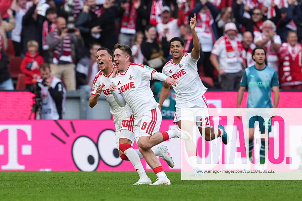 Herren, Fußball, 1.Bundesliga, 1.FC Köln - Borussia Mönchengladbach, Saison 2026 2027, RheinEnergieSTADION: Torjubel nach dem Tor zum 1:0 für den 1.FC Köln durch Torschütze Isak Johannesson (1.FC Köln, 8) zusammen mit Said El Mala (1.FC Köln, 10) und Jahmai Simpson-Pusey (1.FC Köln, 22) DFB regulations prohibit any use of photographs as image sequences and or quasi-video.