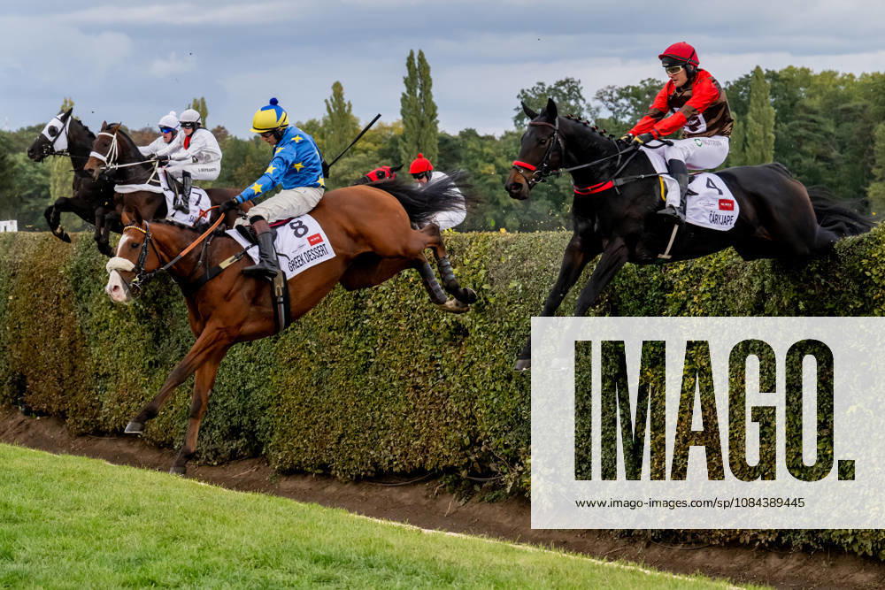 The 136th Grand Pardubice Steeplechase (6,900m), in Pardubice, Czech Republic, on October 11, 2026. The horses are crossing the Taxis Ditch. From the right: Adam Cmiel on Caryjape and James Best on Greek Dessert. (CTKxPhoto DavidxTanecek) CTKPhotoP2026101104510 CTKPhotoP2026101104510