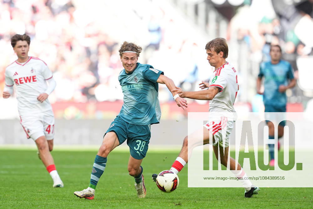 Herren, Fußball, 1.Bundesliga, 1.FC Köln - Borussia Mönchengladbach, Saison 2026 2027, RheinEnergieSTADION: Hugo Bolin (Borussia Moenchengladbach, 38) im Zweikampf gegen Borna Sosa (1.FC Köln, 3) DFB regulations prohibit any use of photographs as image sequences and or quasi-video.
