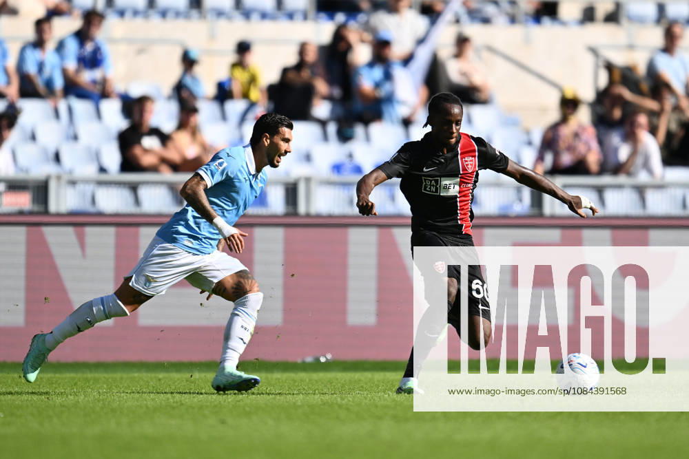 IPA89552573 - Mattia Zaccagni of S.S. Lazio and Eddy Kouadio of A.C. Monza are in action during Matchday 6 of the Serie A Championship between S.S. Lazio and A.C. Monza at the Olympic Stadium on October 11, 2026, in Rome, Italy.