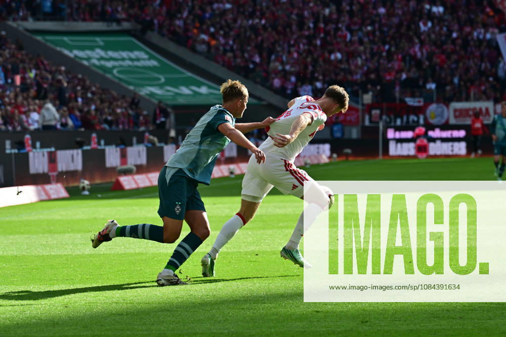 Koeln; Fussball, Herren, Saison 2026 2027, 1. FC Koeln vs. Borussia Moenchengladbach Zweikampf zwischen v. li. Jan Leszczynski (Gladbach), Marias Buelter (Koeln) DFL regulations prohibit any use of photographs as image sequences and or quasi-video. Rhein-Energie-Stadion Nordrhein-Westfalen Deutschland
