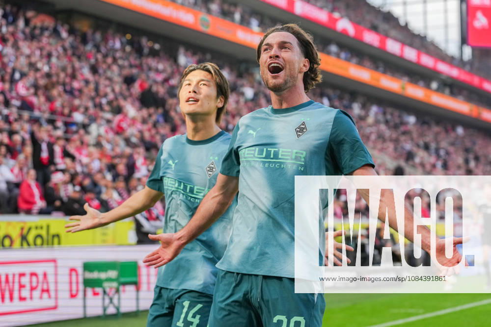 Herren, Fußball, 1.Bundesliga, 1.FC Köln - Borussia Mönchengladbach, Saison 2026 2027, RheinEnergieSTADION: Torjubel nach dem Tor zum 1:1 für Borussia Mönchengladbach durch Torschütze Joe Scally (Borussia Moenchengladbach, 29) zusammen mit Daiki Hashioka (Borussia Moenchengladbach, 14) DFB regulations prohibit any use of photographs as image sequences and or quasi-video.