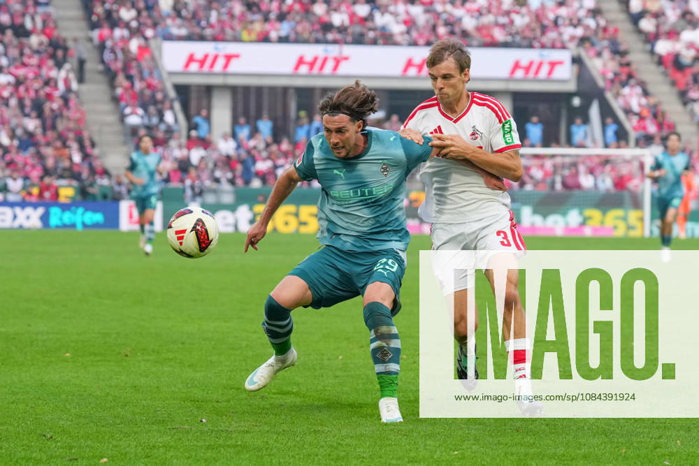 Herren, Fußball, 1.Bundesliga, 1.FC Köln - Borussia Mönchengladbach, Saison 2026 2027, RheinEnergieSTADION: Joe Scally (Borussia Moenchengladbach, 29) im Zweikampf gegen Borna Sosa (1.FC Köln, 3) DFB regulations prohibit any use of photographs as image sequences and or quasi-video.