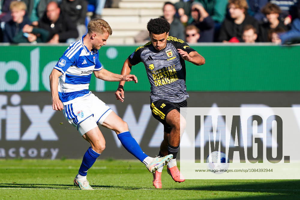 2026-10-11 VriendenLoterij Eredivisie: PEC Zwolle v SC Cambuur ZWOLLE, NETHERLANDS - OCTOBER 11: Simon Graves of PEC Zwolle and Rafik El Arguioui of SC Cambuur during the VriendenLoterij Eredivisie match between PEC Zwolle and SC Cambuur at Mac3Park Stadion on October 11, 2026 in Zwolle, Netherlands. Zwolle Mac3Park Stadion Netherlands Content not available for redistribution in The Netherlands directly or indirectly through any third parties.