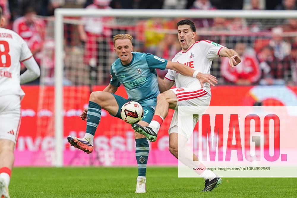 Herren, Fußball, 1.Bundesliga, 1.FC Köln - Borussia Mönchengladbach, Saison 2026 2027, RheinEnergieSTADION: Isac Lidberg (Borussia Moenchengladbach, 3) im Zweikampf gegen Luka Lochoshvili (1.FC Köln, 24) DFB regulations prohibit any use of photographs as image sequences and or quasi-video.