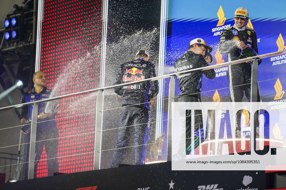 FORMULA 1 SINGAPORE AIRLINES SINGAPORE GRAND PRIX 2026 Max Verstappen (NED) 3 Red Bull Racing, Charles Leclerc (MON) 16 Ferrari, Kimi Antonelli (ITA) 12 Mercedes and Gianpiero Lambiase (Race Engineer of Max Verstappen) on the podium during the Formula 1 Singapore Airlines Singapore Grand Prix 2026, Round 17 of the 2026 Formula 1 World Championship, WM, Weltmeisterschaft from 9th - 11th October 2026 at the Marina Bay Street Circuit, Singapore. Credit: Robbie Hoad Every Second Media Editorial use only. All images are copyright Every Second Media Limited. No images may be reproduced without prior permission.