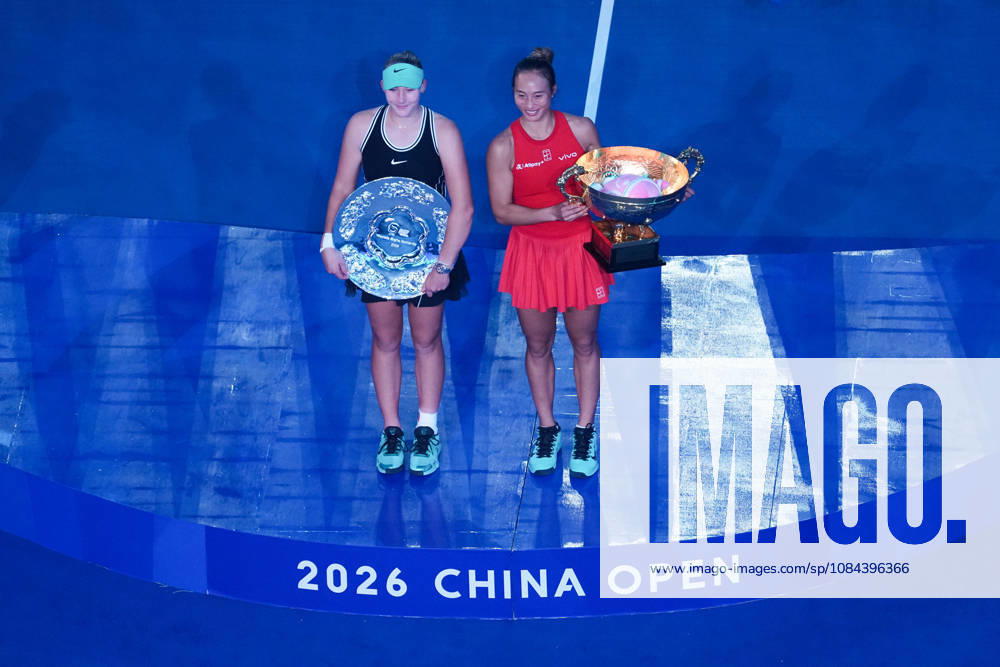 (261011) -- BEIJING, Oct. 11, 2026 -- Zheng Qinwen (R) and Mirra Andreeva pose with their trophies during the awarding ceremony after the women s singles final between Zheng Qinwen of China and Mirra Andreeva of Russia at 2026 China Open tennis tournament in Beijing, China, Oct. 11, 2026. ) (SP)CHINA-BEIJING-TENNIS-CHINA OPEN-WOMEN S SINGLES-FINAL (CN) JuxHuanzong