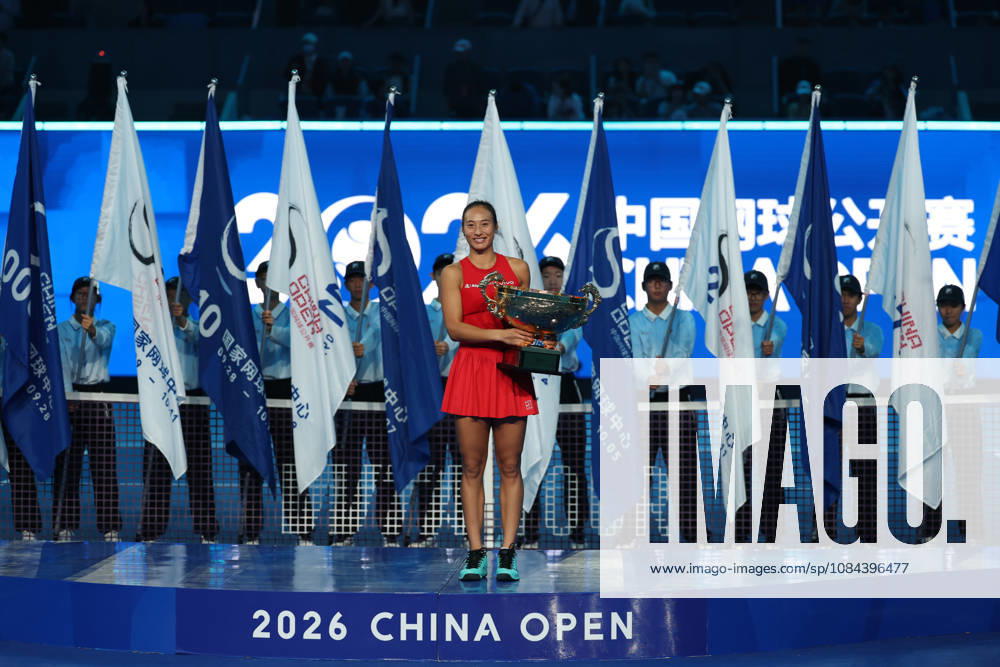 (261011) -- BEIJING, Oct. 11, 2026 -- Zheng Qinwen poses with the trophy during the awarding ceremony after the women s singles final between Zheng Qinwen of China and Mirra Andreeva of Russia at 2026 China Open tennis tournament in Beijing, China, Oct. 11, 2026. ) (SP)CHINA-BEIJING-TENNIS-CHINA OPEN-WOMEN S SINGLES-FINAL (CN) ZhangxChenlin