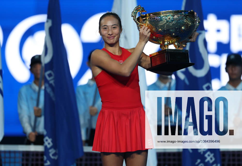 (261011) -- BEIJING, Oct. 11, 2026 -- Zheng Qinwen poses with the trophy during the awarding ceremony after the women s singles final between Zheng Qinwen of China and Mirra Andreeva of Russia at 2026 China Open tennis tournament in Beijing, China, Oct. 11, 2026. ) (SP)CHINA-BEIJING-TENNIS-CHINA OPEN-WOMEN S SINGLES-FINAL (CN) ZhangxChenlin