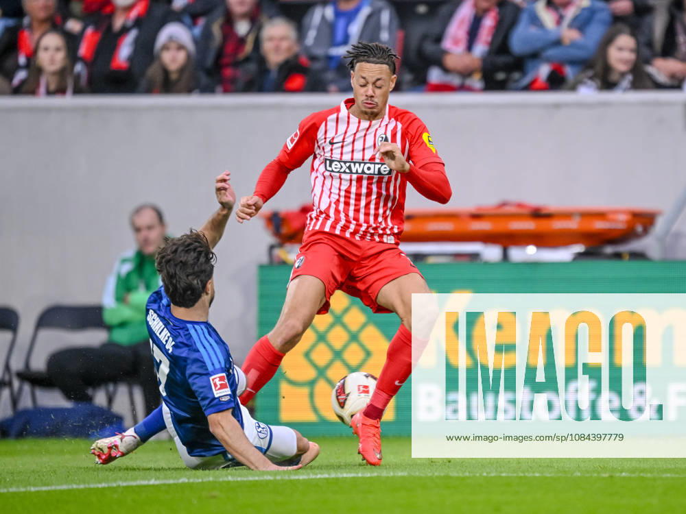 Adrian Gantenbein (FC Schalke 04) und Derry Scherhant (SC Freiburg) im Zweikampf waehrend des spiels der 1. Bundesliga zwischen Club Freiburg und FC Schalke 04, Europa-Park Stadion am 11. October 2026 in Freiburg im Breisgau, Deutschland. (Foto von Harry Langer DeFodi Images) +++ Adrian Gantenbein (FC Schalke 04) und Derry Scherhant (SC Freiburg) battle for the ball during the Bundesliga match between Sport-Club Freiburg and FC Schalke 04 at Europa-Park Stadion on October 11, 2026 in Freiburg im Breisgau, Germany. (Photo by Harry Langer DeFodi Images) DFB DFL REGULATIONS PROHIBIT ANY USE OF PHOTOGRAPHS AS IMAGE SEQUENCES AND OR QUASI-VIDEO. (Photo by Harry Langer DeFodi Images) DFB DFL REGULATIONS PROHIBIT ANY USE OF PHOTOGRAPHS AS IMAGE SEQUENCES AND OR QUASI-VIDEO. -