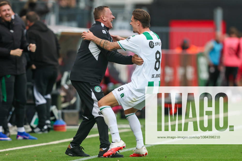 2026-10-11 Excelsior Rotterdam v FC Groningen - Dutch Eredivisie ROTTERDAM, NETHERLANDS - OCTOBER 11: Tika de Jonge of FC Groningen, Bert de Voogd of FC Groningen celebrates after scoring the second goal of the team during the Dutch Eredivisie match between Excelsior Rotterdam and FC Groningen at Stadion Woudestein on October 11, 2026 in Rotterdam, Netherlands. Rotterdam Stadion Woudestein Netherlands Content not available for redistribution in The Netherlands directly or indirectly through any third parties.