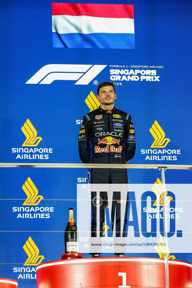 2026 Formula 1 Singapore Grand Prix SINGAPORE - OCT 11: Red Bull Racing driver Max Verstappen (C) celebrates with Ferrari s Charles Leclerc (L) and Mercedes’s Kimi Antonelli (R) on the podium, after winning the Formula 1 Singapore Grand Prix at the Marina Bay Street Circuit in Singapore on October 11, 2026. Daniel Ceng Anadolu Singapore Singapore. Editorial use only. Please get in touch for any other usage.