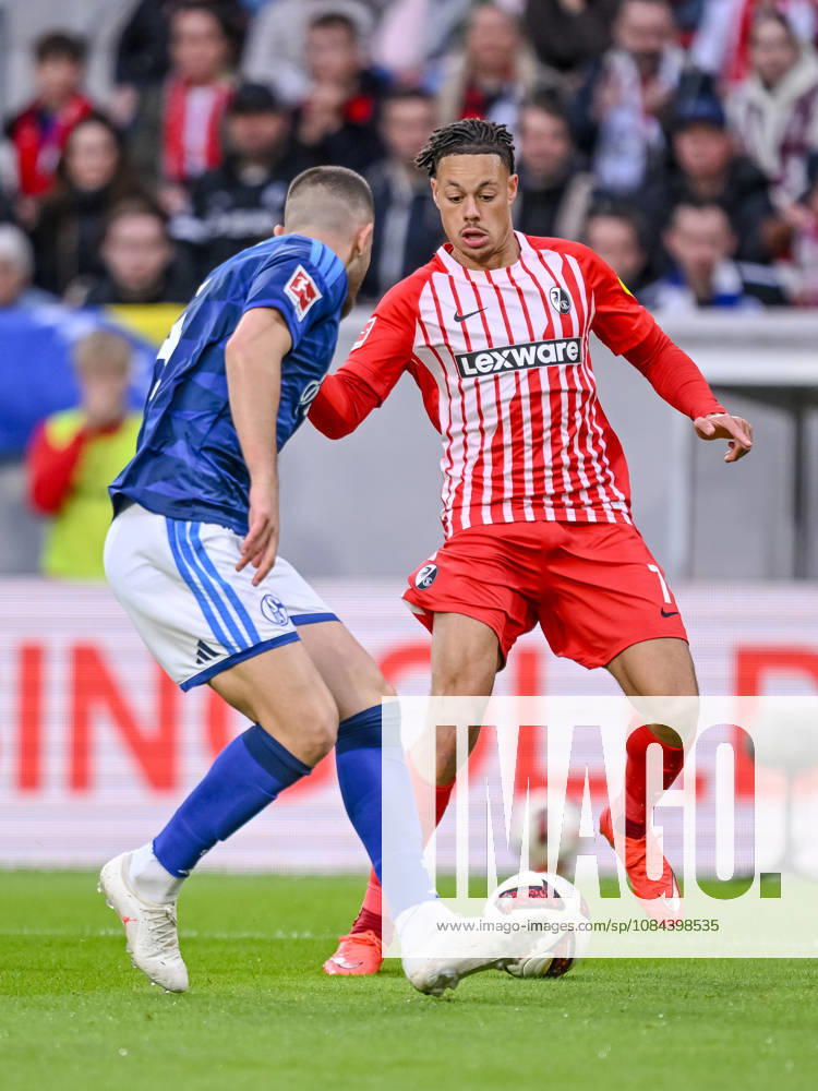 Hasan Kurucay (FC Schalke 04) und Derry Scherhant (SC Freiburg) im Zweikampf waehrend des spiels der 1. Bundesliga zwischen Club Freiburg und FC Schalke 04, Europa-Park Stadion am 11. October 2026 in Freiburg im Breisgau, Deutschland. (Foto von Harry Langer DeFodi Images) +++ Hasan Kurucay (FC Schalke 04) und Derry Scherhant (SC Freiburg) battle for the ball during the Bundesliga match between Sport-Club Freiburg and FC Schalke 04 at Europa-Park Stadion on October 11, 2026 in Freiburg im Breisgau, Germany. (Photo by Harry Langer DeFodi Images) DFB DFL REGULATIONS PROHIBIT ANY USE OF PHOTOGRAPHS AS IMAGE SEQUENCES AND OR QUASI-VIDEO. (Photo by Harry Langer DeFodi Images) DFB DFL REGULATIONS PROHIBIT ANY USE OF PHOTOGRAPHS AS IMAGE SEQUENCES AND OR QUASI-VIDEO. -