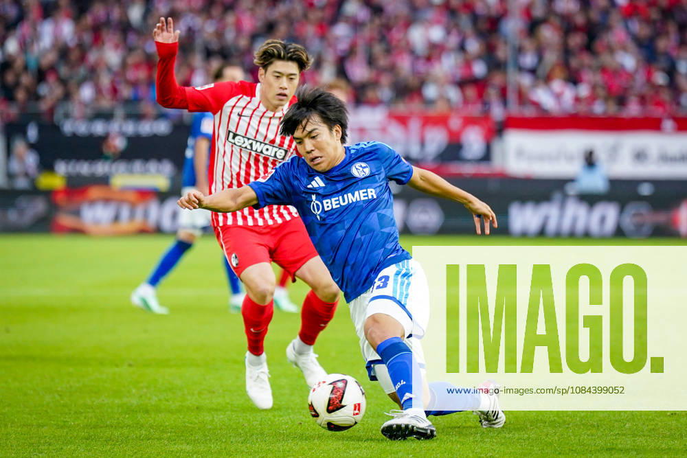 Deutschland: Fußball Bundesliga 2026 - 2027, 5. Spieltag - SC Freiburg - FC Schalke 04 - Europa-Park-Stadion (Freiburg): Satoshi Tanaka (FC Schalke 04, 13) Yuito Suzuki (SC Freiburg, 14)