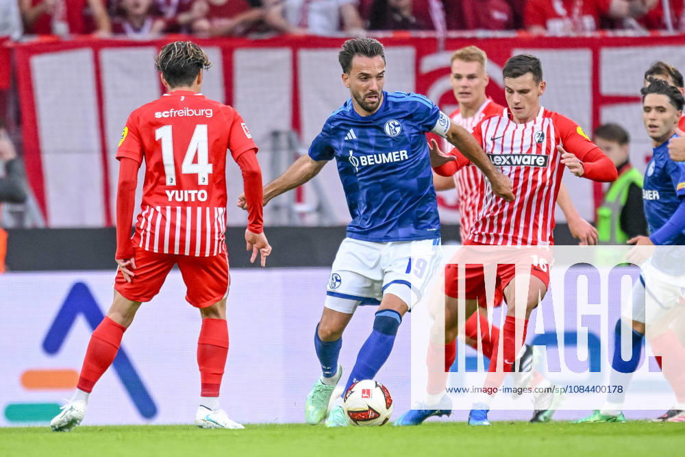 Yuito Suzuki (SC Freiburg), Kenan Karaman (FC Schalke 04) und Yannik Engelhardt (SC Freiburg) im Zweikampf waehrend des spiels der 1. Bundesliga zwischen Club Freiburg und FC Schalke 04, Europa-Park Stadion am 11. October 2026 in Freiburg im Breisgau, Deutschland. (Foto von Harry Langer DeFodi Images) +++ Yuito Suzuki (SC Freiburg), Kenan Karaman (FC Schalke 04) und Yannik Engelhardt (SC Freiburg) battle for the ball during the Bundesliga match between Sport-Club Freiburg and FC Schalke 04 at Europa-Park Stadion on October 11, 2026 in Freiburg im Breisgau, Germany. (Photo by Harry Langer DeFodi Images) DFB DFL REGULATIONS PROHIBIT ANY USE OF PHOTOGRAPHS AS IMAGE SEQUENCES AND OR QUASI-VIDEO. (Photo by Harry Langer DeFodi Images) DFB DFL REGULATIONS PROHIBIT ANY USE OF PHOTOGRAPHS AS IMAGE SEQUENCES AND OR QUASI-VIDEO. -