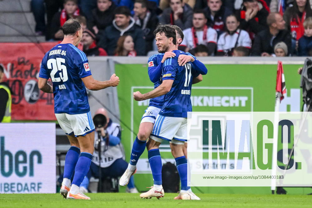 Adrian Gantenbein (FC Schalke 04) Torjubel, jubelt mit seiner Mannschaft nach treffer zum 1:1 waehrend des spiels der 1. Bundesliga zwischen Club Freiburg und FC Schalke 04, Europa-Park Stadion am 11. October 2026 in Freiburg im Breisgau, Deutschland. (Foto von Harry Langer DeFodi Images) +++ Adrian Gantenbein (FC Schalke 04) celebrates after scoring his team s first goal with teammates during the Bundesliga match between Sport-Club Freiburg and FC Schalke 04 at Europa-Park Stadion on October 11, 2026 in Freiburg im Breisgau, Germany. (Photo by Harry Langer DeFodi Images) DFB DFL REGULATIONS PROHIBIT ANY USE OF PHOTOGRAPHS AS IMAGE SEQUENCES AND OR QUASI-VIDEO. (Photo by Harry Langer DeFodi Images) DFB DFL REGULATIONS PROHIBIT ANY USE OF PHOTOGRAPHS AS IMAGE SEQUENCES AND OR QUASI-VIDEO. -