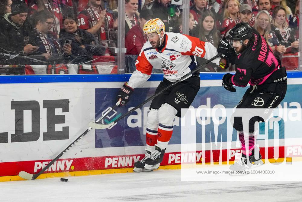 Eishockey Penny-DEL 8.Spieltag Kölner Haie - Nürnberg Ice Tigers am 11.10.2026 in der Lanxess Arena in Köln Constantin Braun ( Nürnberg ), links - Ryan Macinnis ( Köln ), rechts Gemäß den Vorgaben der DEL Deutsche Eishockey Liga ist die Publikation und Weiterverwertung der Aufnahmen in elektronischen Medien und Endgeräten aller Art während des laufenden Spiels nicht zulässig.