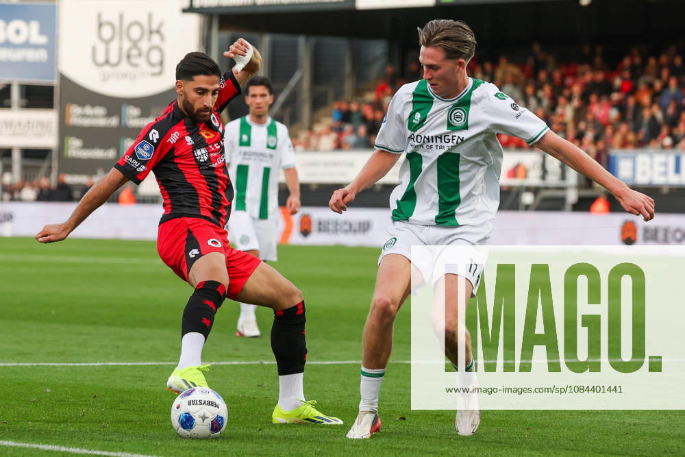 2026-10-11 Excelsior Rotterdam v FC Groningen - Dutch Eredivisie ROTTERDAM, NETHERLANDS - OCTOBER 11: Alireza Jahanbakhsh of Excelsior Rotterdam is challenged by David van der Werff of FC Groningen during the Dutch Eredivisie match between Excelsior Rotterdam and FC Groningen at Stadion Woudestein on October 11, 2026 in Rotterdam, Netherlands. Rotterdam Stadion Woudestein Netherlands Content not available for redistribution in The Netherlands directly or indirectly through any third parties.