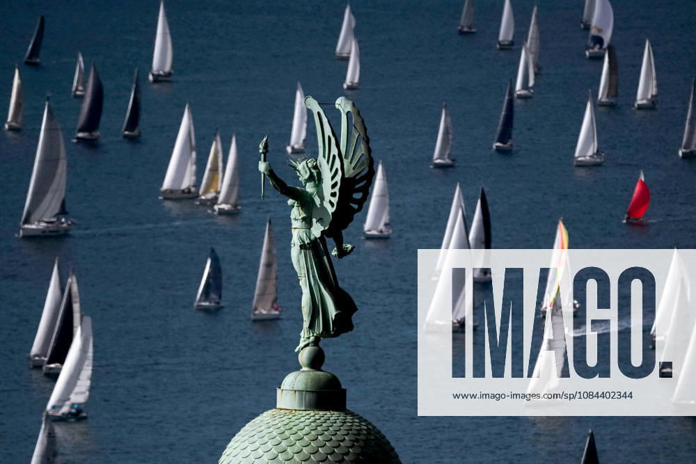 Barcolana 58 Regatta in Trieste TRIESTE, ITALY - OCTOBER 11: Boats are seen while passing the Victory Lighthouse in Trieste, Italy on October 11, 2026. The 58th edition of the Barcolana sailing regatta was held in the Gulf of Trieste, where 1,885 professional and amateur sailing boats competed in the largest sailing competition in the world. The Barcolana Autumn Cup was won by Furio Benussi aboard ARCA SGR with a time of 1 hour, 5 minutes, and 9 seconds. Valeria Ferraro Anadolu Trieste Spain. Editorial use only. Please get in touch for any other usage.
