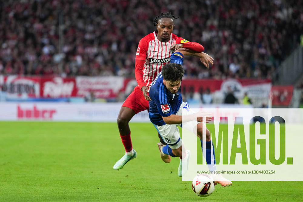 1. Bundesliga: SC Freiburg vs FC Schalke 04, 11.10.2026 Zweikampf zwischen Adrian Gantenbein (FC Schalke 04, 17) und Jordy Makengo (SC Freiburg, 33) 1. Bundesliga: SC Freiburg vs FC Schalke 04, Europa-Park-Stadion, 11.10.2026 DFB DFL REGULATIONS PROHIBIT ANY USE OF PHOTOGRAPHS AS IMAGE SEQUENCES AND OR QUASI-VIDEO.