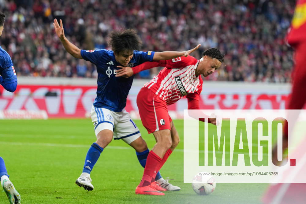 1. Bundesliga: SC Freiburg vs FC Schalke 04, 11.10.2026 Zweikampf zwischen Satoshi Tanaka (FC Schalke 04, 13) und Derry Scherhant (SC Freiburg, 7) 1. Bundesliga: SC Freiburg vs FC Schalke 04, Europa-Park-Stadion, 11.10.2026 DFB DFL REGULATIONS PROHIBIT ANY USE OF PHOTOGRAPHS AS IMAGE SEQUENCES AND OR QUASI-VIDEO.