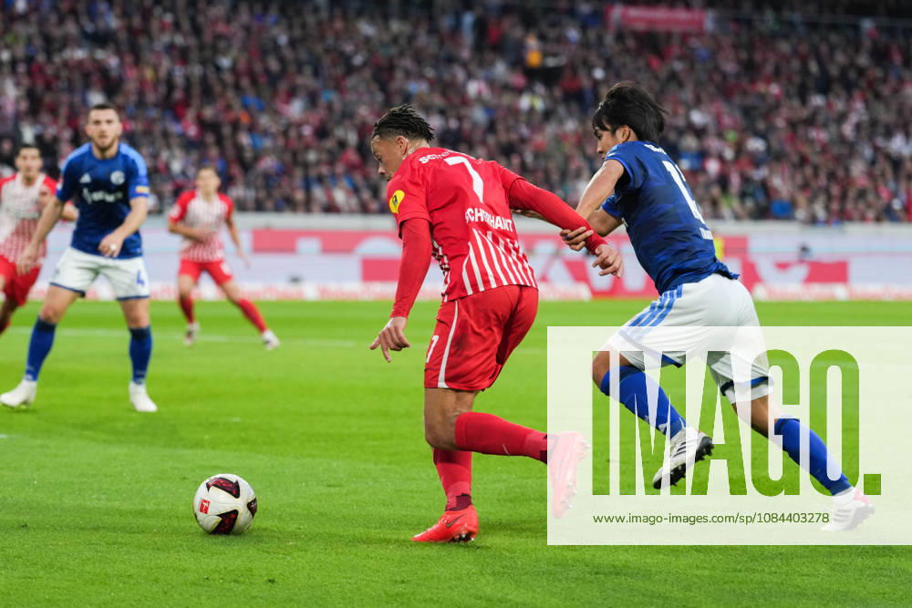 1. Bundesliga: SC Freiburg vs FC Schalke 04, 11.10.2026 Zweikampf zwischen Satoshi Tanaka (FC Schalke 04, 13) und Derry Scherhant (SC Freiburg, 7) 1. Bundesliga: SC Freiburg vs FC Schalke 04, Europa-Park-Stadion, 11.10.2026 DFB DFL REGULATIONS PROHIBIT ANY USE OF PHOTOGRAPHS AS IMAGE SEQUENCES AND OR QUASI-VIDEO.