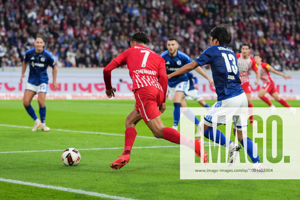1. Bundesliga: SC Freiburg vs FC Schalke 04, 11.10.2026 Zweikampf zwischen Satoshi Tanaka (FC Schalke 04, 13) und Derry Scherhant (SC Freiburg, 7) 1. Bundesliga: SC Freiburg vs FC Schalke 04, Europa-Park-Stadion, 11.10.2026 DFB DFL REGULATIONS PROHIBIT ANY USE OF PHOTOGRAPHS AS IMAGE SEQUENCES AND OR QUASI-VIDEO.