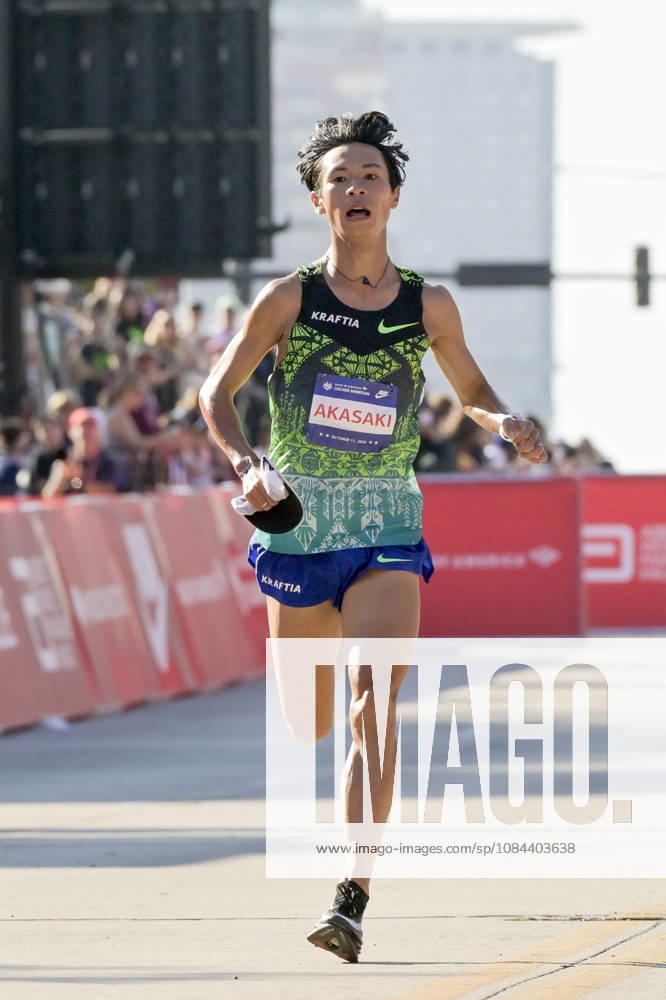 Akira Akasaki of Japan crosses the finish line with a time of 02:05:47 placing 9th over all during 2026 Bank of America Chicago Marathon in Chicago on Sunday, Oct. 11, 2026. CHI20261011102 MARKxBLACK