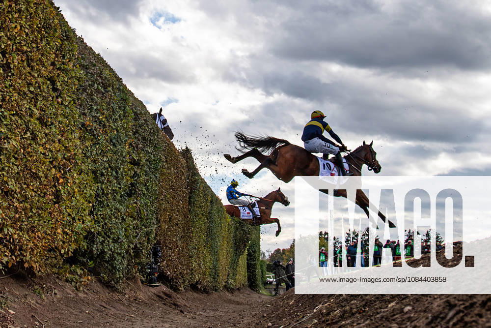 The 136th Grand Pardubice Steeplechase (6,900m), in Pardubice, Czech Republic, on October 11, 2026. From left: James Best on Greek Dessert and Keith Michael Donoghue on Final Orders clear the Taxis Ditch. (CTKxPhoto DavidxTanecek) CTKPhotoP2026101105370 CTKPhotoP2026101105370