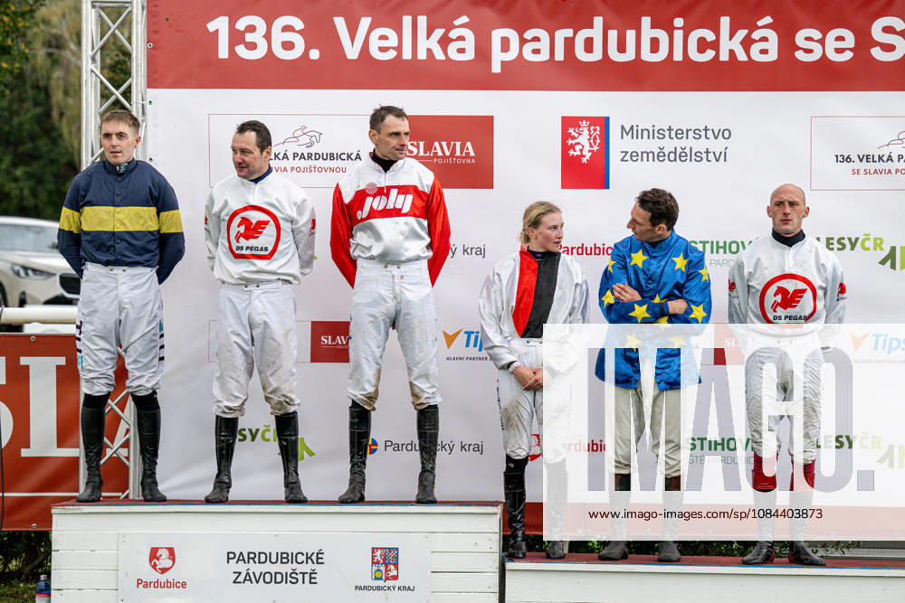 The 136th Grand Pardubice Steeplechase (6,900m), in Pardubice, Czech Republic, on October 11, 2026. From left: Winner Keith Michael Donoghue (Final Orders), the second placed Jan Faltejsek (Godfrey), the third Jan Odlozil (Angkor Wat), the fourth Lenka Neprasova (Sacamiro), the fifth James Best (Greek Dessert), and the sixth Ondrej Velek (High in the Sky) on the podium. (CTKxPhoto DavidxTanecek) CTKPhotoP2026101105417 CTKPhotoP2026101105417