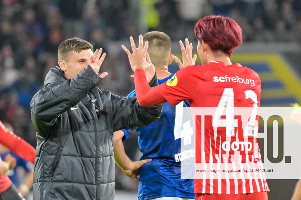 Keisuke Goto (SC Freiburg, 42) und Yannik Engelhardt (SC Freiburg, 16) jubeln. GER, SC Freiburg vs Schalke 04, Fussball, Bundesliga, 5. Spieltag, Saison 2026 2027, 11.10.2026 DFL DFB REGULATIONS PROHIBIT ANY USE OF PHOTOGRAPHS AS IMAGE SEQUENCES AND OR QUASI-VIDEO GER, SC Freiburg vs Schalke 04, Fussball, Bundesliga, 5. Spieltag, Saison 2026 2027, 11.10.2026 Freiburg