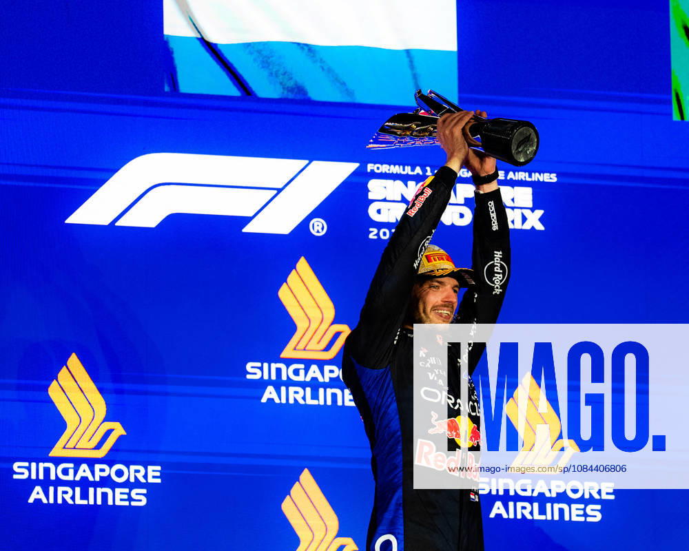 2026 Formula 1 Singapore Grand Prix - Podium MAX VERSTAPPEN 1 (NED) of Oracle Red Bull Racing (Red Bull Racing RB22) with the trophy on Sunday Race Day during the Formula 1 Singapore Airlines Singapore Grand Prix 2026 at Marina Bay Street Circuit, Singapore, on October 11, 2026. Photo by Antoine Lapeyre Reveries Agency via ABACAPRESS.COM Singapore Singapore