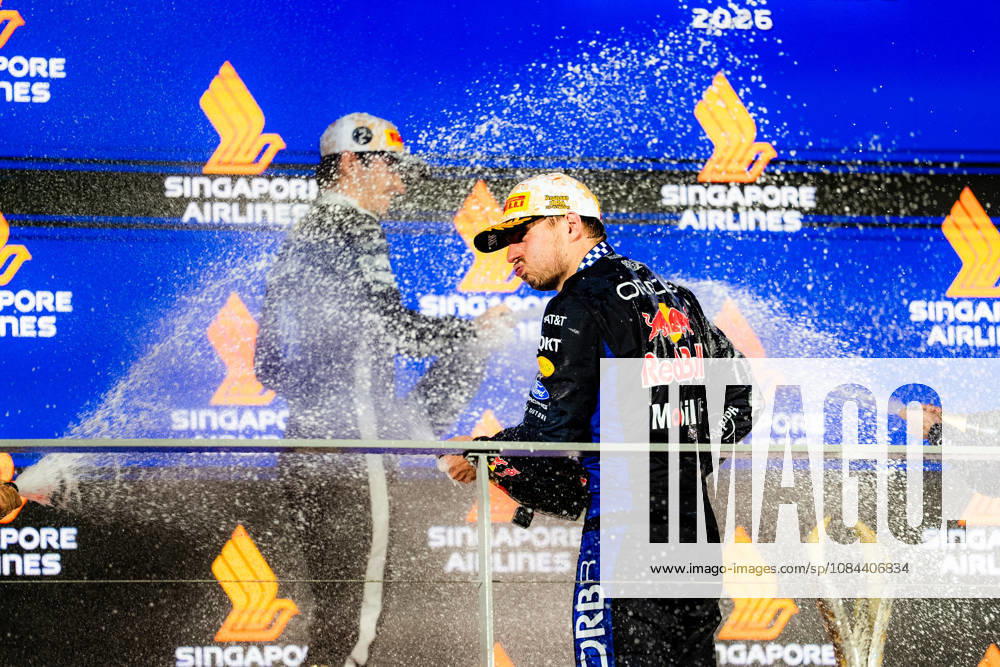 2026 Formula 1 Singapore Grand Prix - Podium CHARLES LECLERC 16 (MON) of Scuderia Ferrari HP (Ferrari SF-26) and MAX VERSTAPPEN 1 (NED) of Oracle Red Bull Racing (Red Bull Racing RB22) champagne celebration on the podium on Sunday Race Day during the Formula 1 Singapore Airlines Singapore Grand Prix 2026 at Marina Bay Street Circuit, Singapore, on October 11, 2026. Photo by Antoine Lapeyre Reveries Agency via ABACAPRESS.COM Singapore Singapore