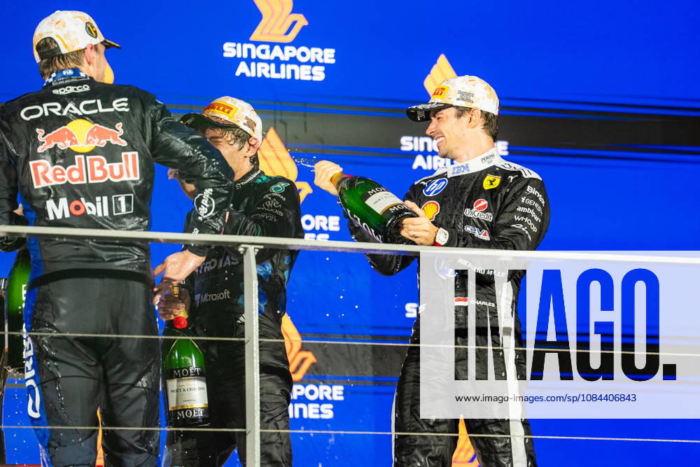 2026 Formula 1 Singapore Grand Prix - Podium MAX VERSTAPPEN 1 (NED) of Oracle Red Bull Racing (Red Bull Racing RB22) GIANPIERO LAMBIASE (ITA) Race Engineer for Oracle Red Bull Racing (Red Bull Racing RB22) CHARLES LECLERC 16 (MON) of Scuderia Ferrari HP (Ferrari SF-26) and ANDREA KIMI ANTONELLI 12 (ITA) of Mercedes-AMG PETRONAS Formula One Team (Mercedes-AMG F1 W17) celebrating on the podium on Sunday Race Day during the Formula 1 Singapore Airlines Singapore Grand Prix 2026 at Marina Bay Street Circuit, Singapore, on October 11, 2026. Photo by Antoine Lapeyre Reveries Agency via ABACAPRESS.COM Singapore Singapore