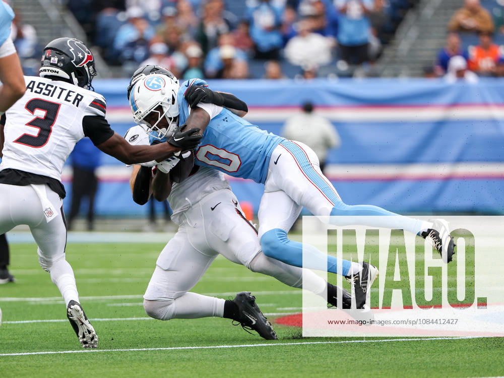 Oct 11, 2026; Nashville, TN, USA; Tennessee Titans wide receiver Calvin Ridley (0) tackled by Houston Texans linebacker Jake Hansen (35) during the NFL, American Football Herren, USA regular season game between the Houston Texans and Tennessee Titans at Nissan Stadium. Mandatory Credit: -Cal Media NFL 2026: Texans Vs Titans OCT 11 - ZUMAc04_ 20261011_zma_c04_042