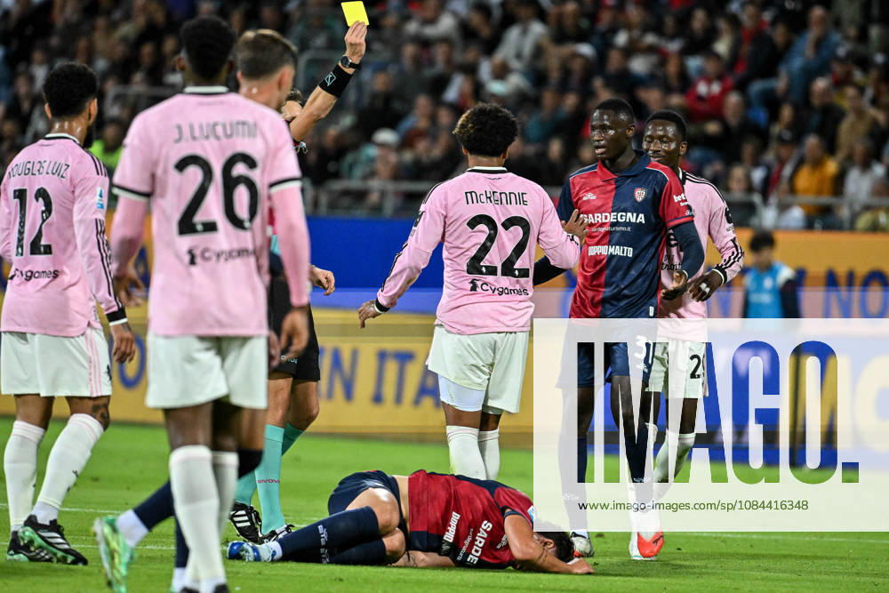 IPA89566244 - Alessandro Romano of Cagliari Calcio, Weston McKennie of Juventus FC, Yellow Card during the Cagliari Calcio vs. Juventus FC Italian Serie A soccer match in Cagliari, Italy