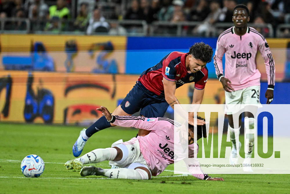 IPA89566286 - Alessandro Romano of Cagliari Calcio, Weston McKennie of Juventus FC, yellow card during the Cagliari Calcio vs. Juventus FC Italian Serie A soccer match in Cagliari, Italy